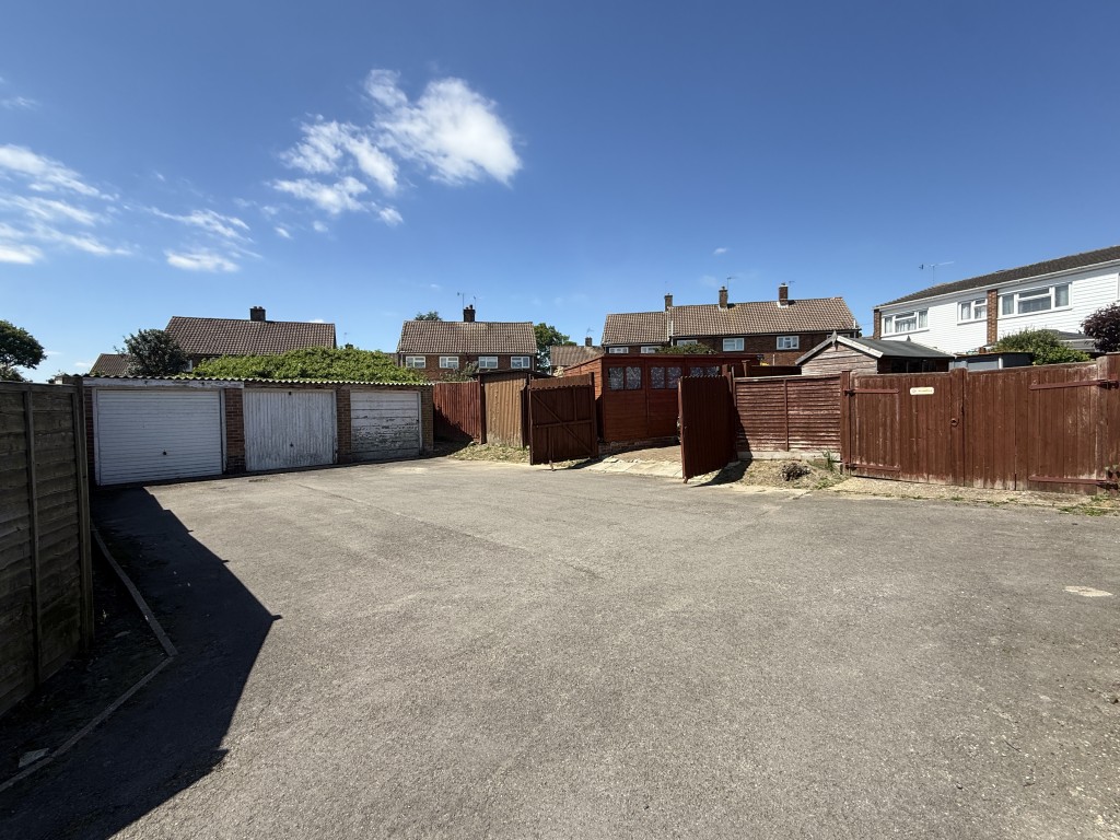 Lot: 21 - COMPOUND OF FOUR GARAGES - General view of Forecourt in Compound